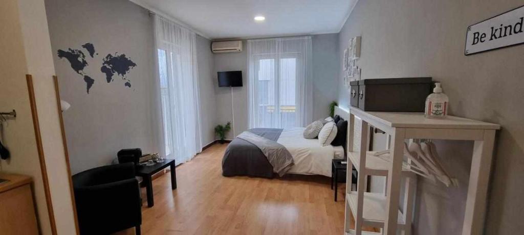 Posteľ alebo postele v izbe v ubytovaní Laura Home