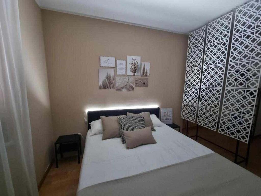 Posteľ alebo postele v izbe v ubytovaní Laura Home