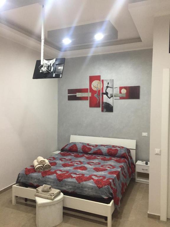 A bed or beds in a room at Berenice Suite