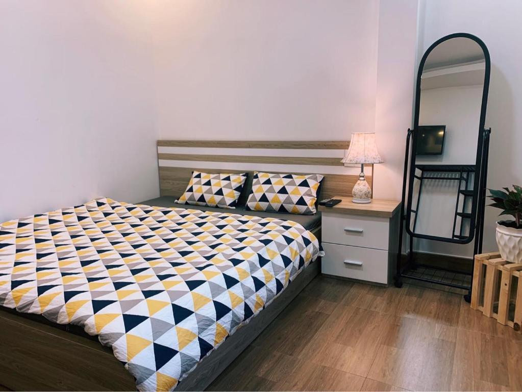 Postel nebo postele na pokoji v ubytování Trang Nguyen House