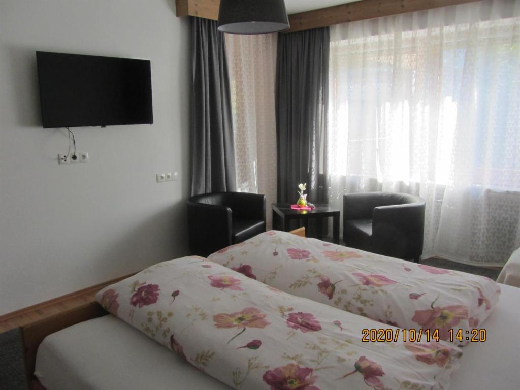 Postel nebo postele na pokoji v ubytování Haus Hager