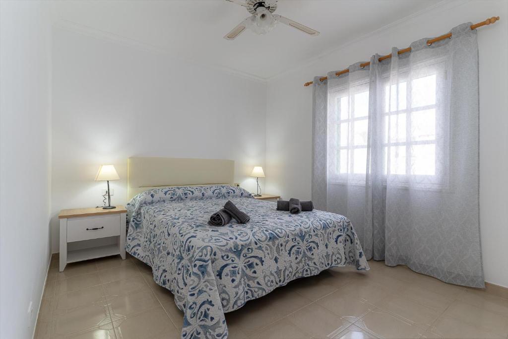 A bed or beds in a room at Apartamento Sussa 7A by HH