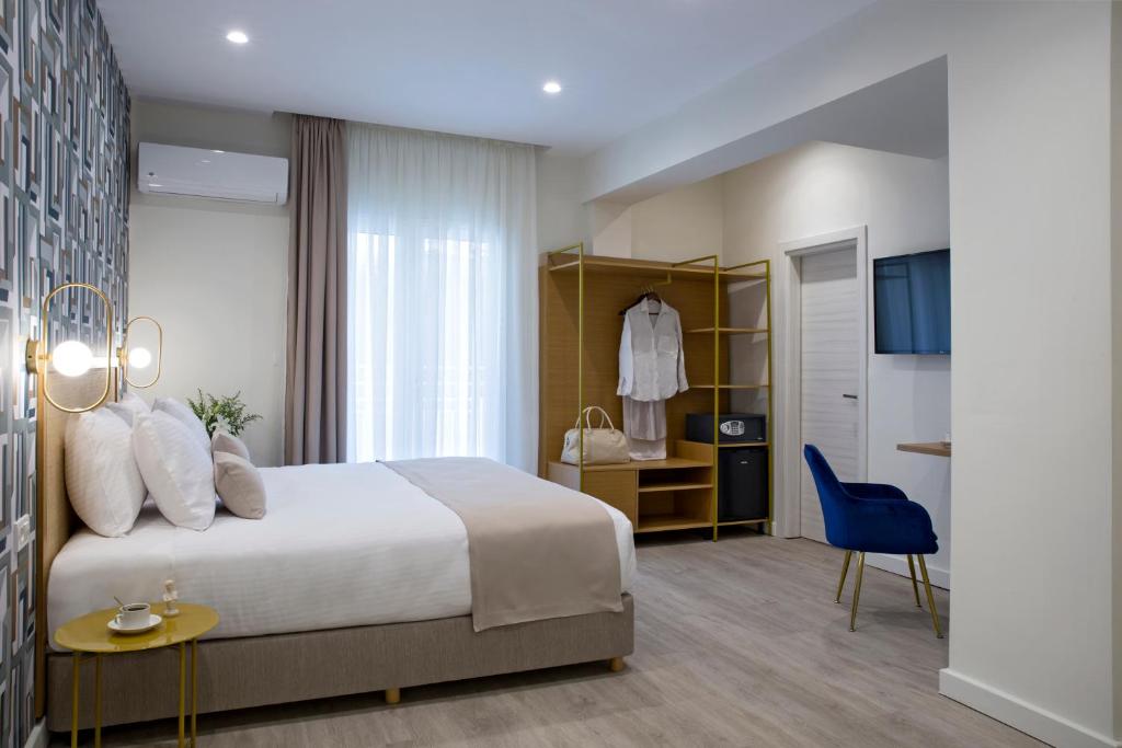 Postel nebo postele na pokoji v ubytování Hypnos Inn Athens