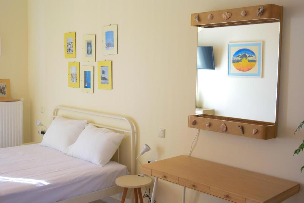 Posteľ alebo postele v izbe v ubytovaní Aris Apartment