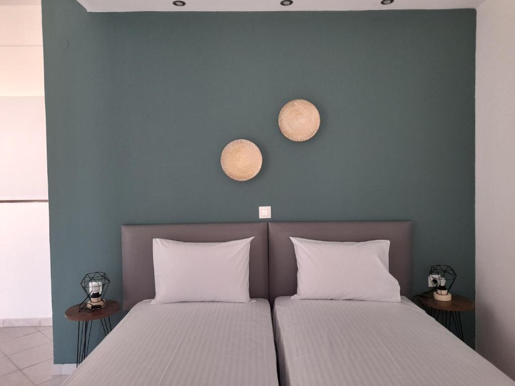 Tempat tidur dalam kamar di EUPHORIA COMPLEX2