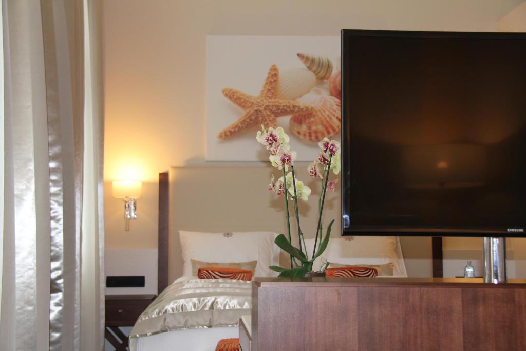 Posteľ alebo postele v izbe v ubytovaní Boutique Hotel Adria