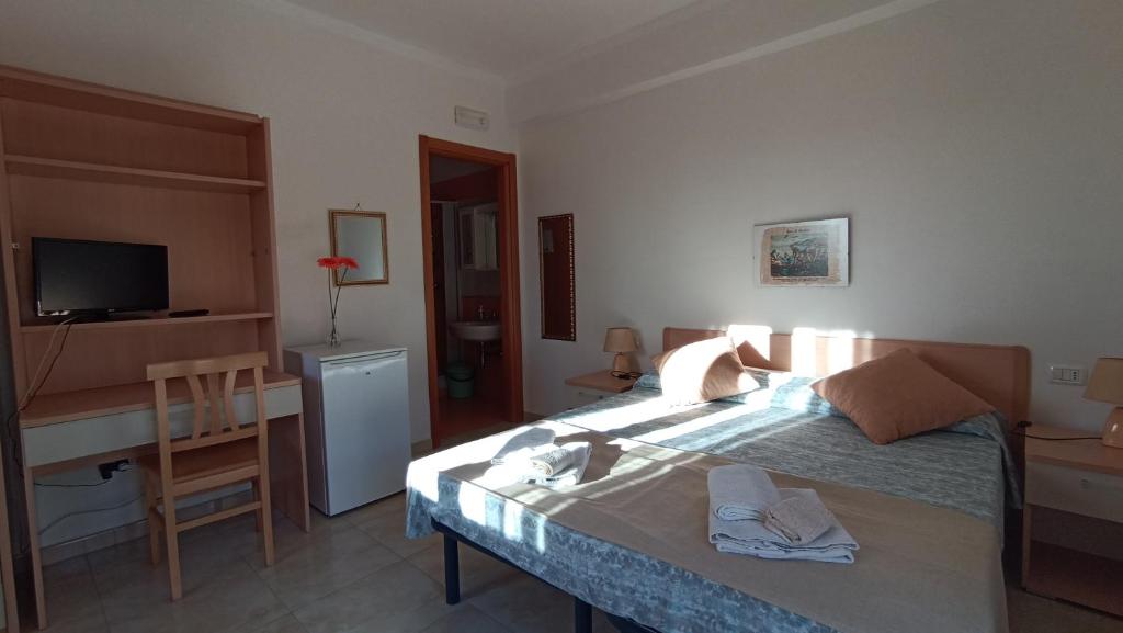 Postel nebo postele na pokoji v ubytování B&B Villa Maria Ester