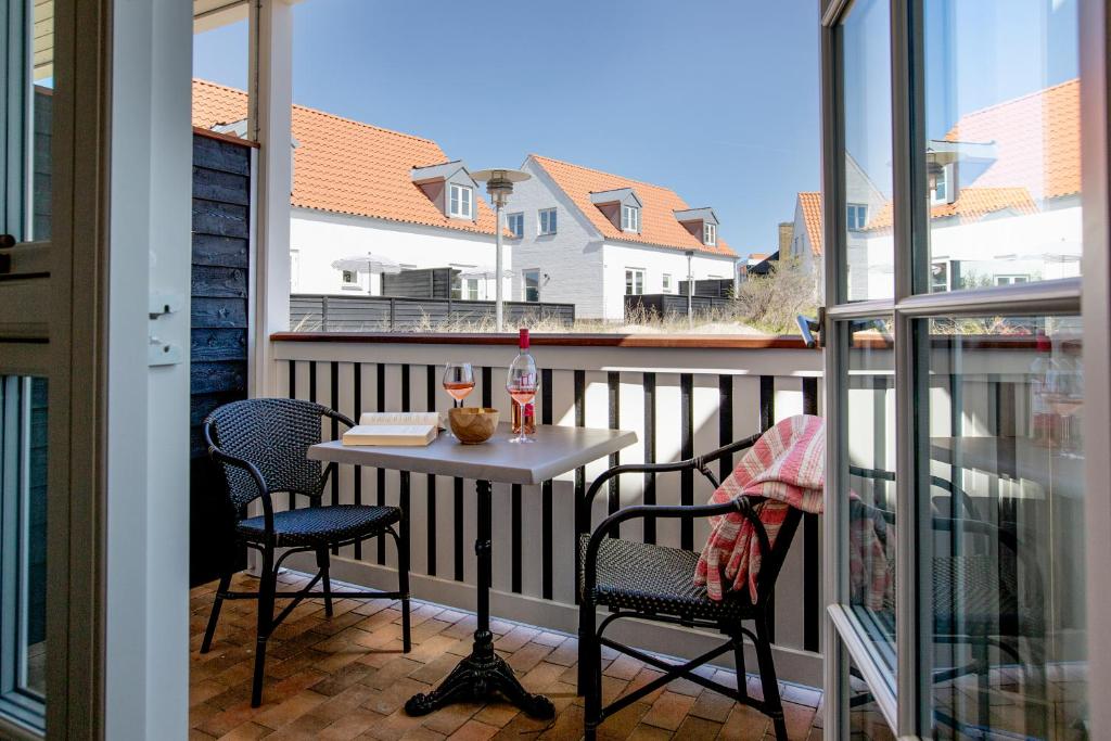Balkón nebo terasa v ubytování Hjerting Badehotel
