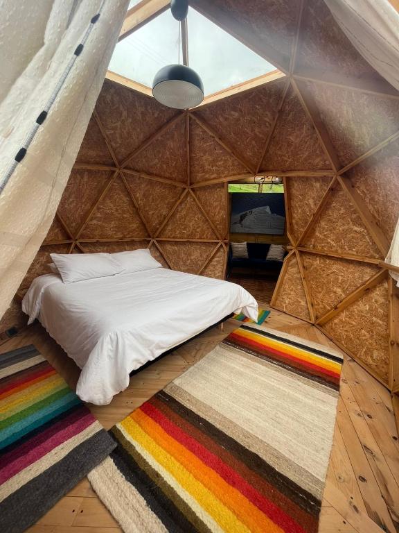 Postel nebo postele na pokoji v ubytování MonteLuna Glamping