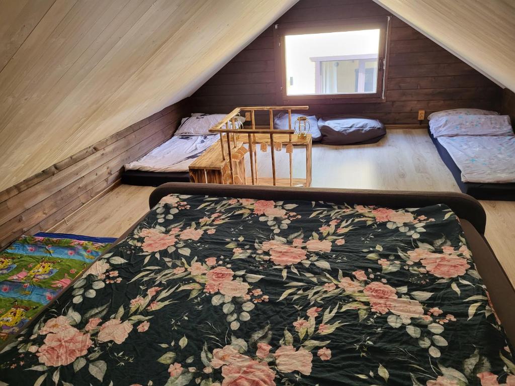 Postel nebo postele na pokoji v ubytování Tiny house near Viljandi lake