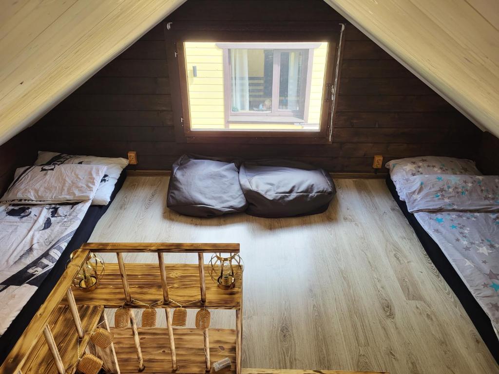 Postel nebo postele na pokoji v ubytování Tiny house near Viljandi lake