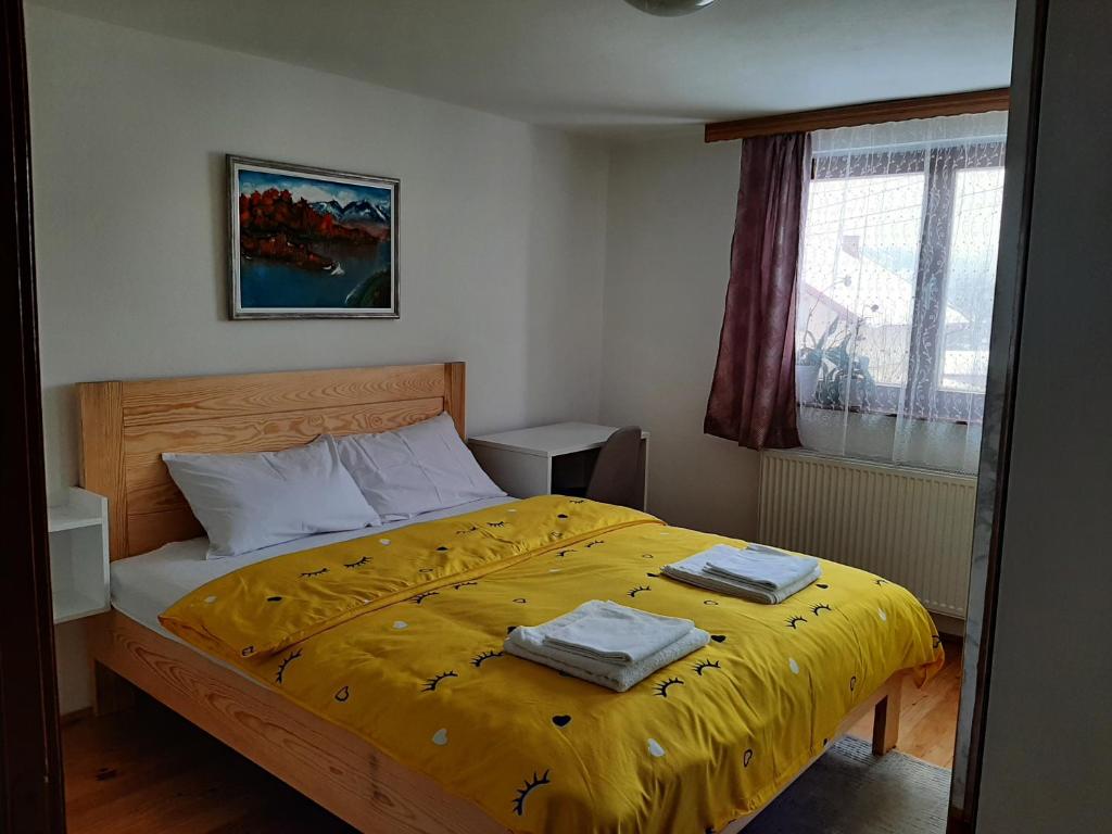Postel nebo postele na pokoji v ubytování Aleksandar apartmani