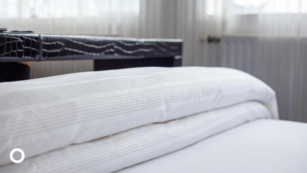 Postel nebo postele na pokoji v ubytování Thingholt by Center Hotels
