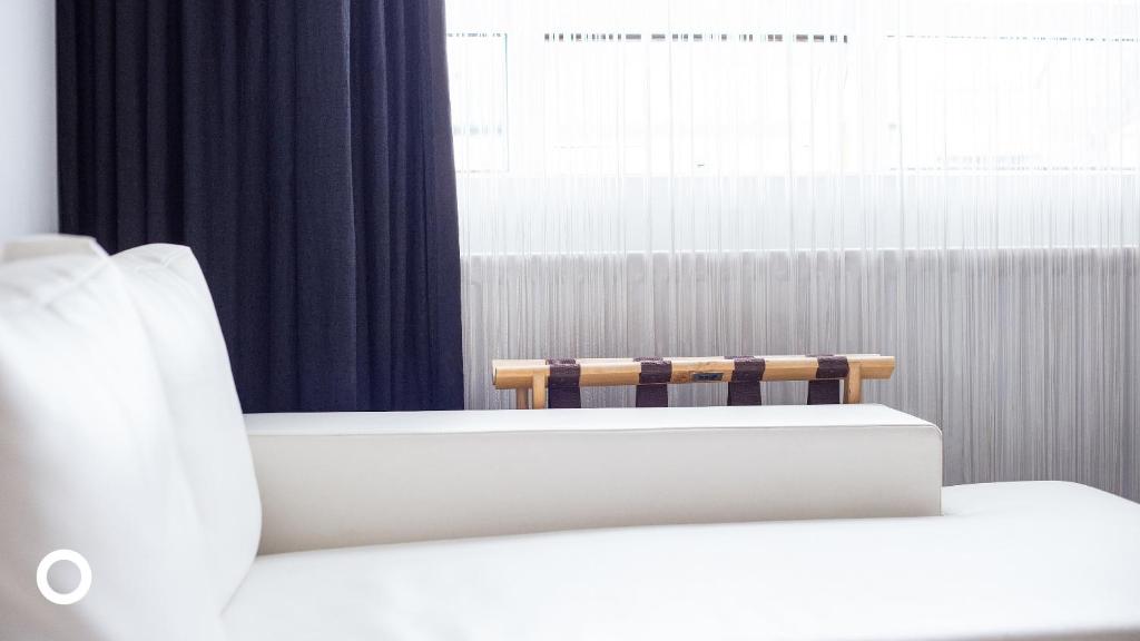 Postel nebo postele na pokoji v ubytování Thingholt by Center Hotels