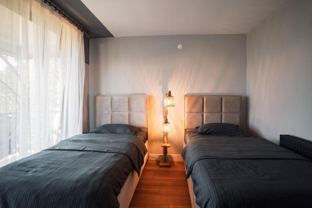 Postel nebo postele na pokoji v ubytování Blacksea Dream House