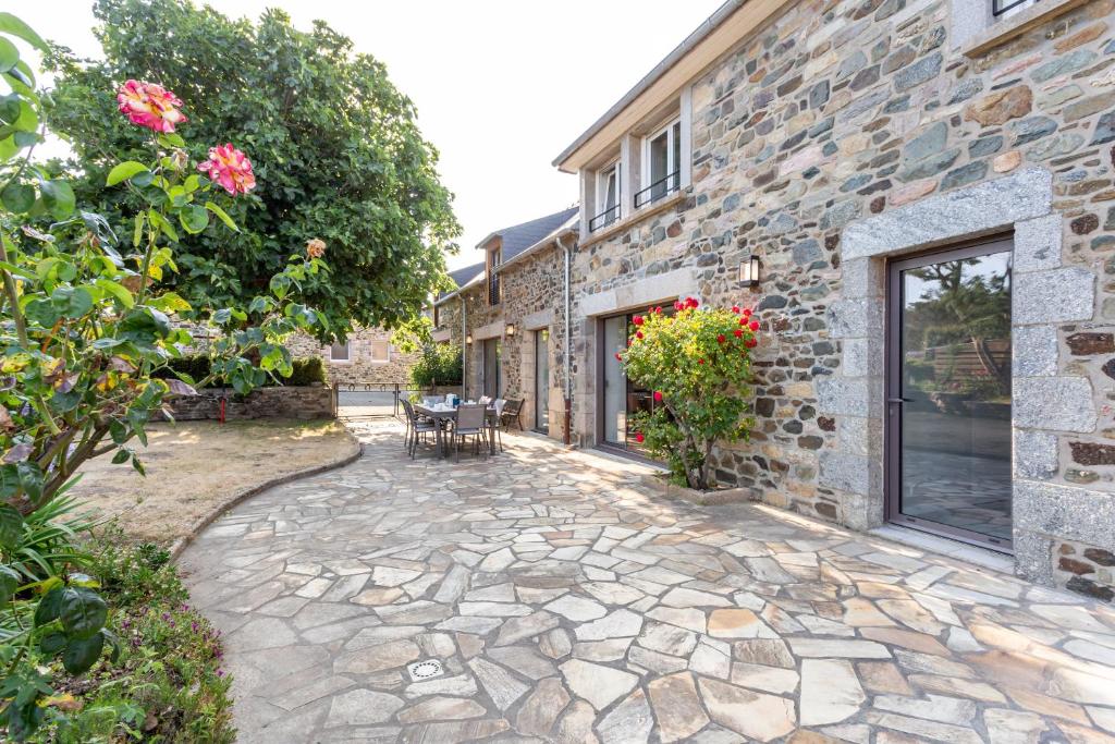 Um jardim em Le Refuge Marin - Gîte familial au bord de mer