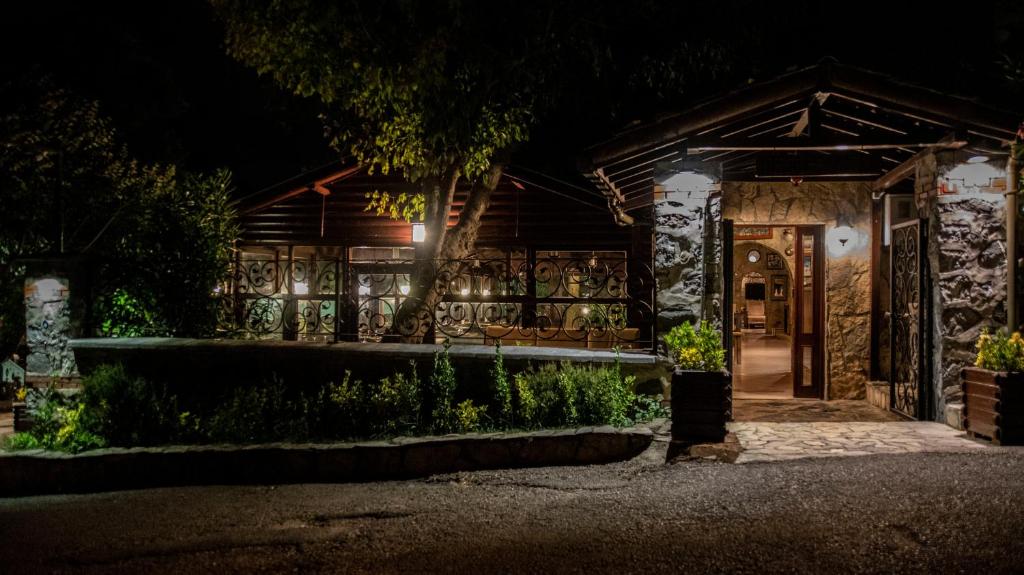 a house at night with the front door lit up at Fener Motel in Şile