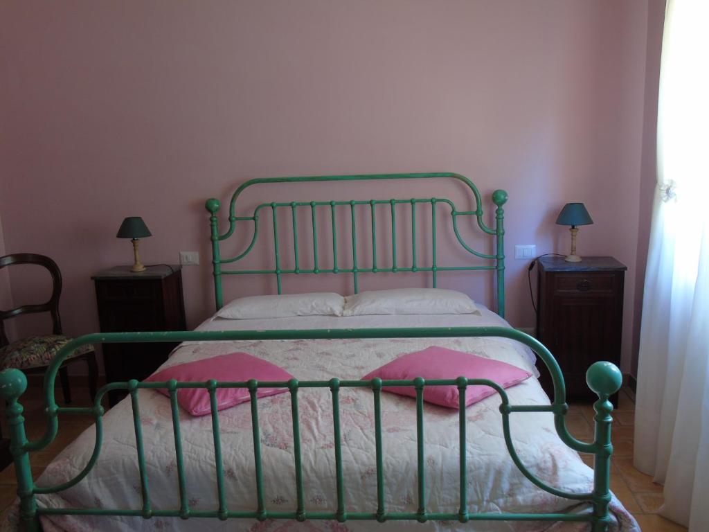 Posteľ alebo postele v izbe v ubytovaní Agriturismo Camera Rosa