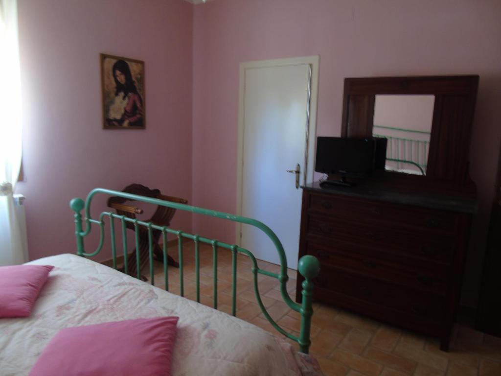 Posteľ alebo postele v izbe v ubytovaní Agriturismo Camera Rosa