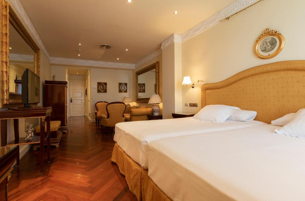 Cama ou camas em um quarto em Hotel Alameda Palace