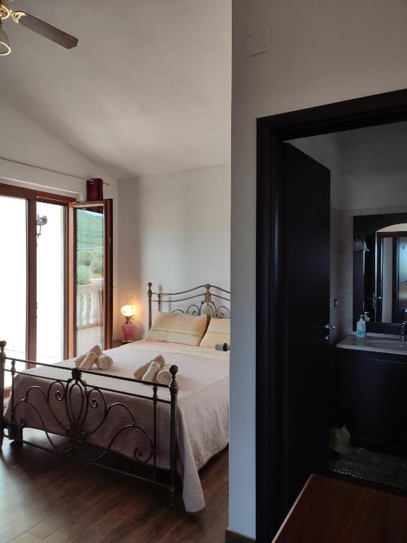 Postel nebo postele na pokoji v ubytování Gio Horses B&B