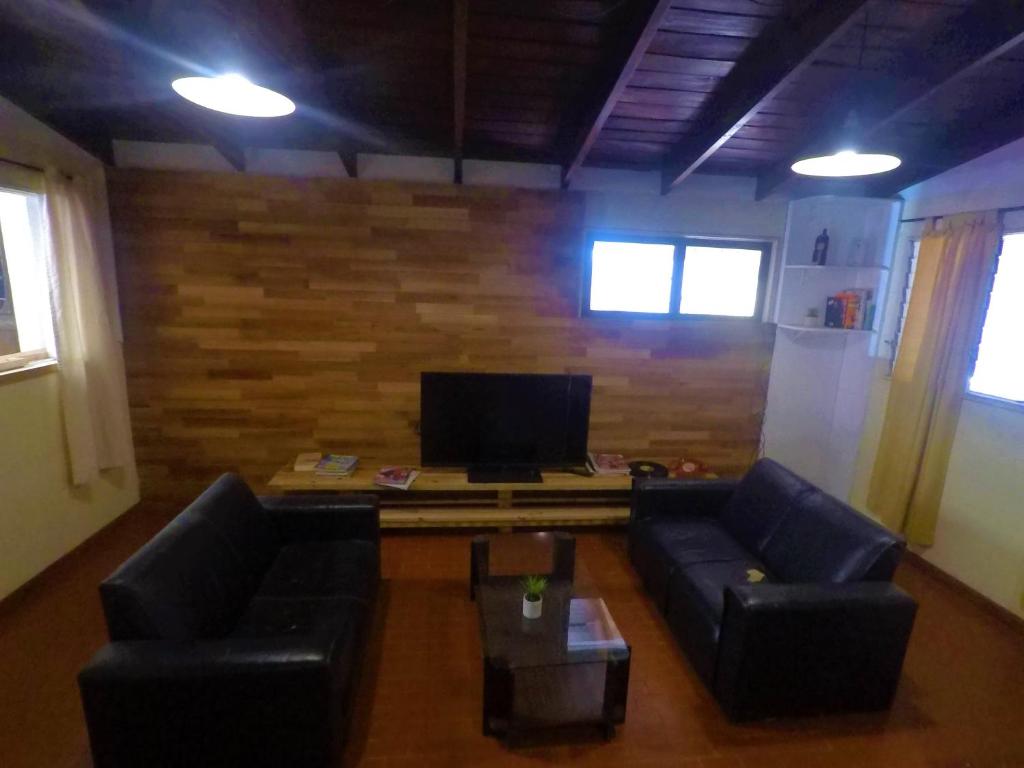 TV a/nebo společenská místnost v ubytování Cataratas Jazz Hostel