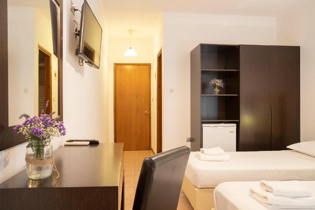 Postel nebo postele na pokoji v ubytování OCEANA Beach Hotel