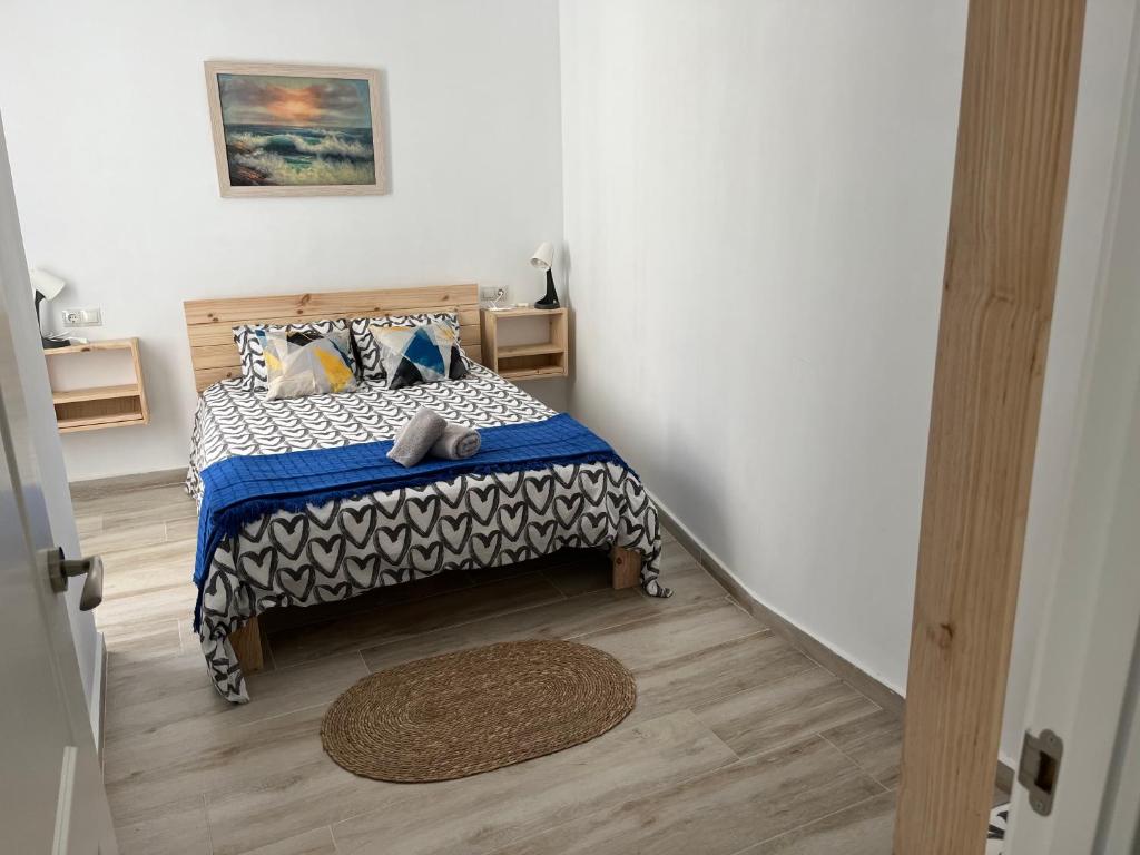 Postel nebo postele na pokoji v ubytování Alzira bonita Apartamento B con patio, la Casella