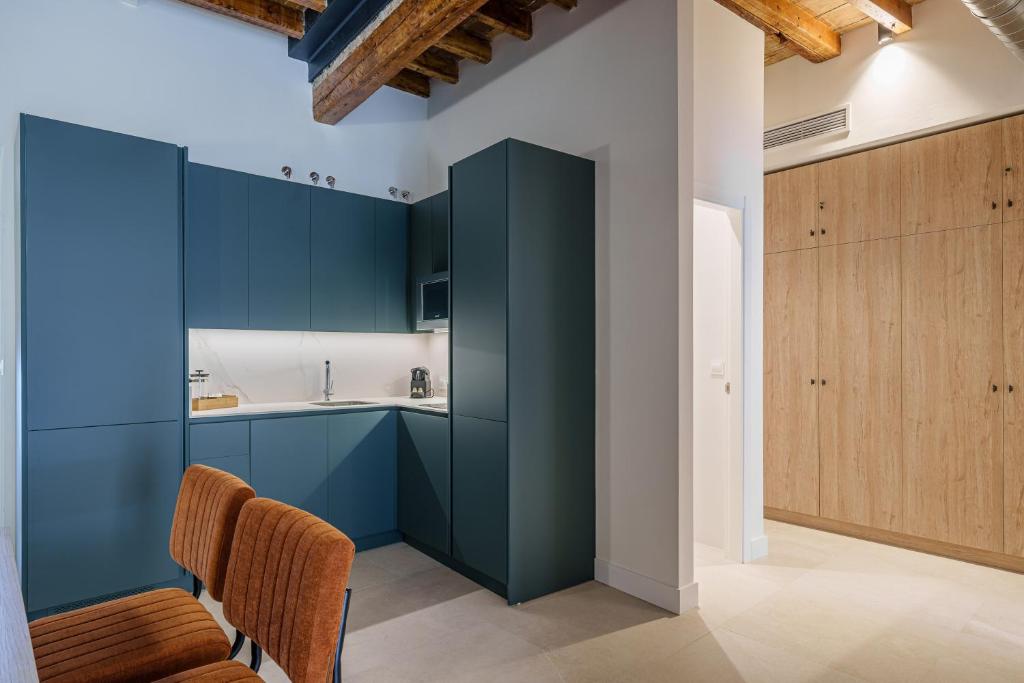 Kuchyňa alebo kuchynka v ubytovaní Homely Málaga Mariblanca 17, Vegafuente Apartments