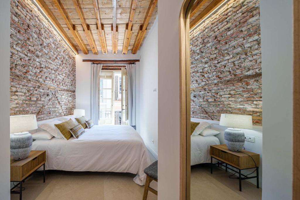 Posteľ alebo postele v izbe v ubytovaní Homely Málaga Mariblanca 17, Vegafuente Apartments