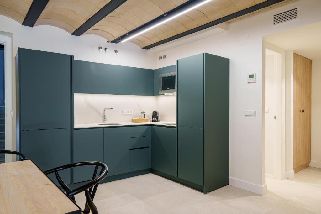 Kuchyňa alebo kuchynka v ubytovaní Homely Málaga Mariblanca 17, Vegafuente Apartments