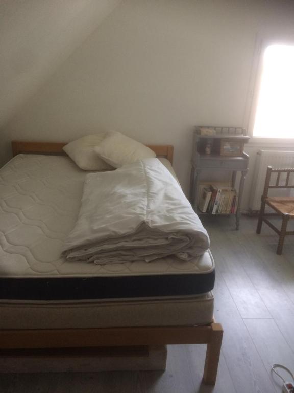 Ein Bett oder Betten in einem Zimmer der Unterkunft Chez Marylène 3 maison