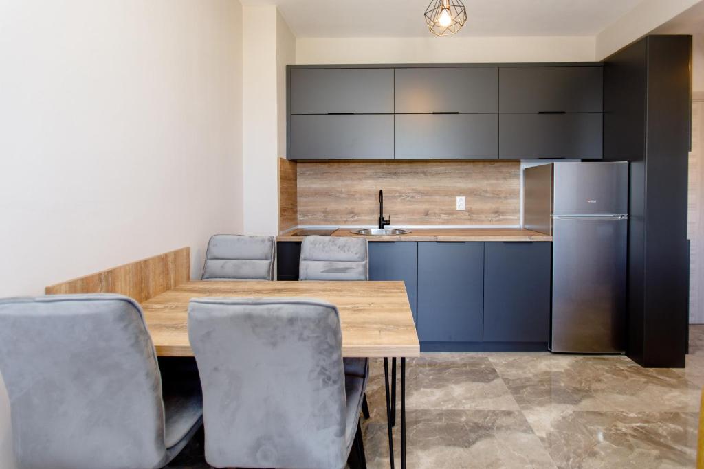 Kuchyň nebo kuchyňský kout v ubytování Apartments Posejdon Lux