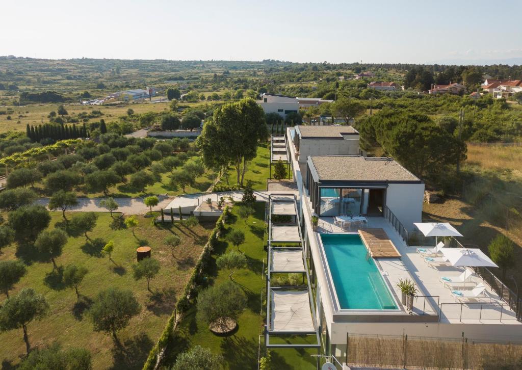 an aerial view of a house with a swimming pool at Villa Albina & Domenica in Zadar