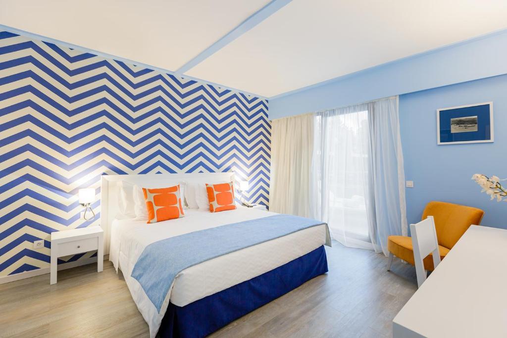 Postel nebo postele na pokoji v ubytování Terrace Mar Suite Hotel