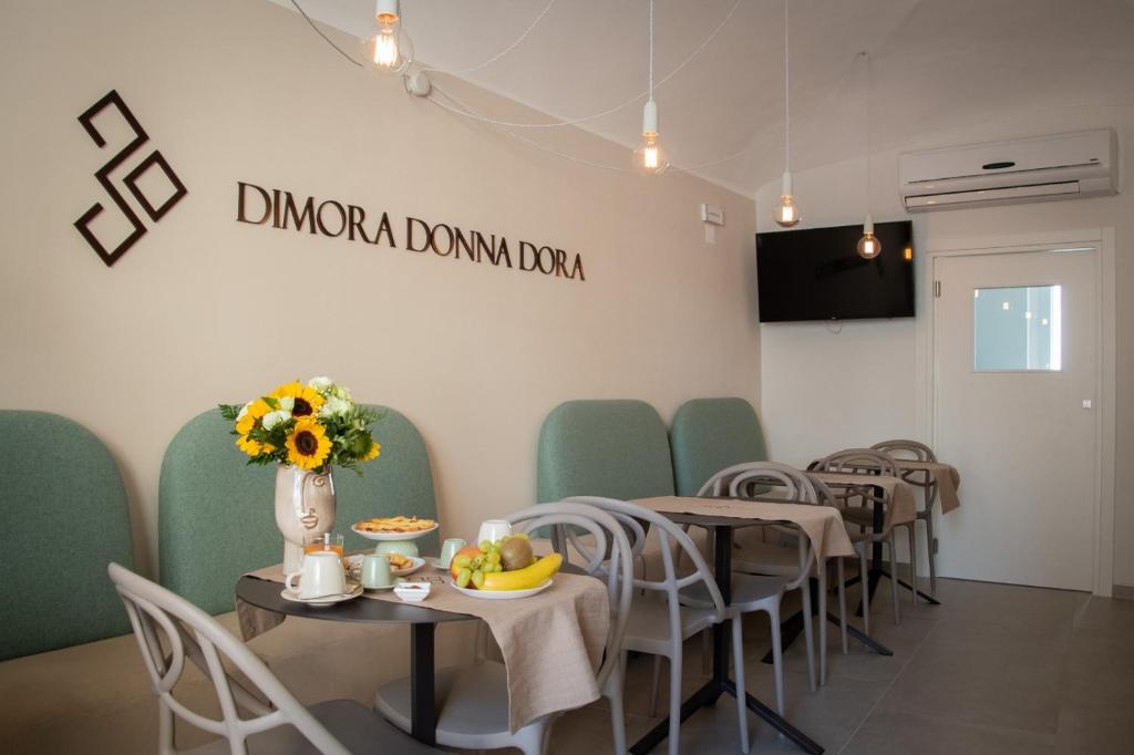 TV a/nebo společenská místnost v ubytování Dimora Donna Dora - Albergo Diffuso