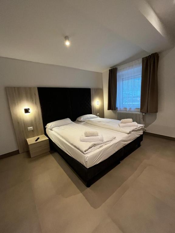Łóżko lub łóżka w pokoju w obiekcie Bilo - Apartments for rent