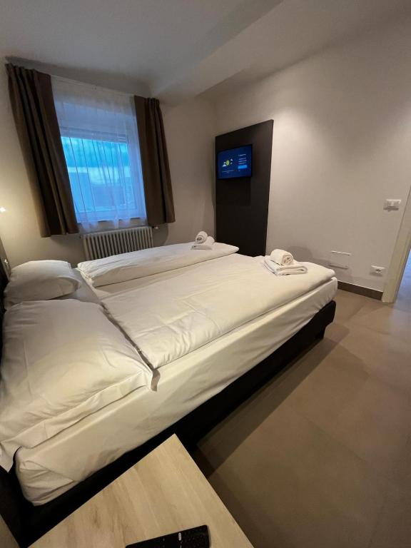 Łóżko lub łóżka w pokoju w obiekcie Bilo - Apartments for rent