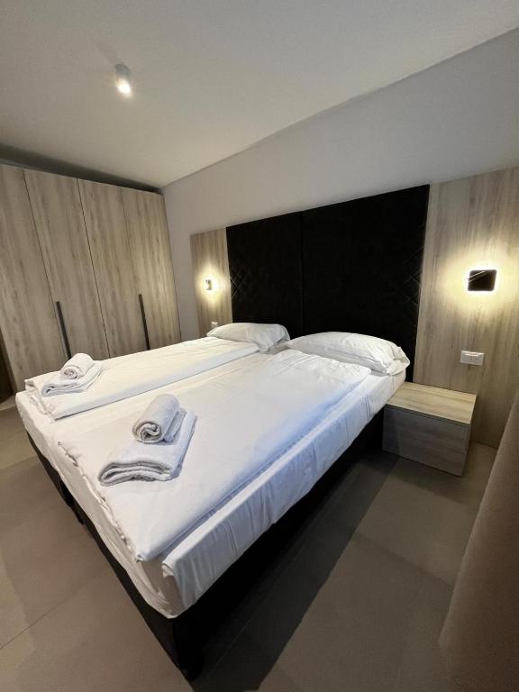 Łóżko lub łóżka w pokoju w obiekcie Bilo - Apartments for rent