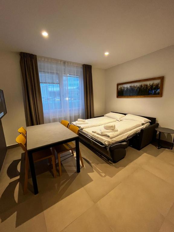 Łóżko lub łóżka w pokoju w obiekcie Bilo - Apartments for rent