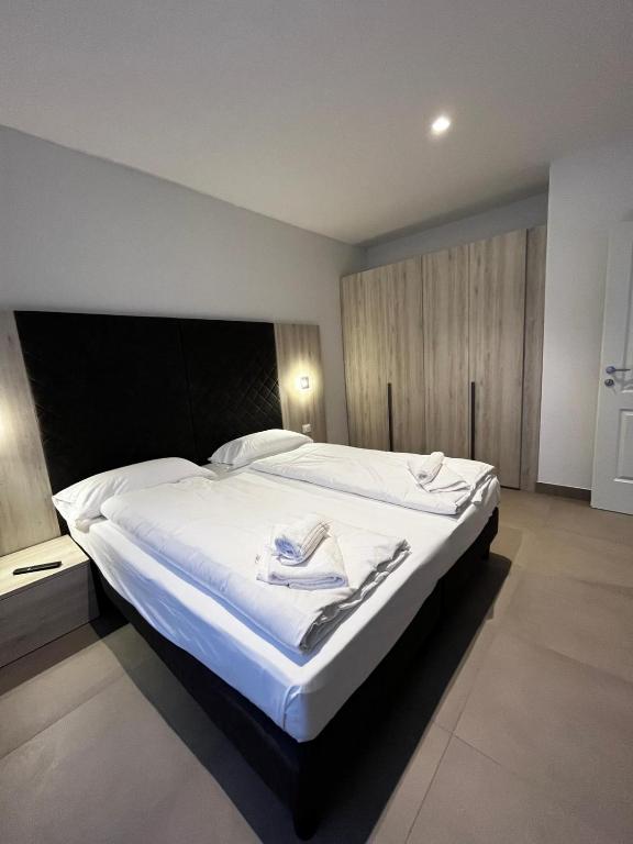 Łóżko lub łóżka w pokoju w obiekcie Bilo - Apartments for rent