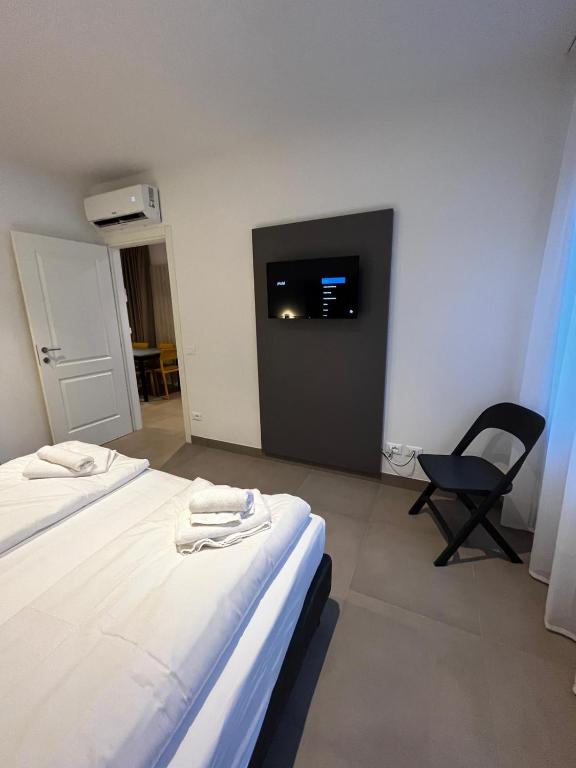 Łóżko lub łóżka w pokoju w obiekcie Bilo - Apartments for rent