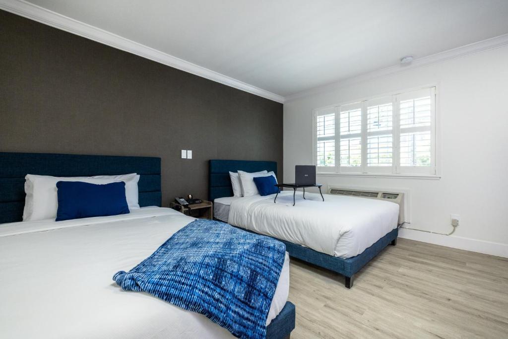 Кровать или кровати в номере WAFER 450 Hotel