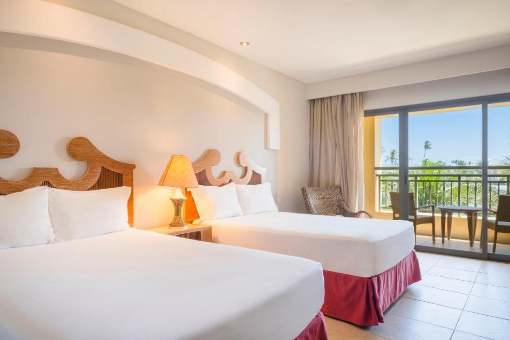 Postel nebo postele na pokoji v ubytování Iberostar Waves Bahia - All Inclusive