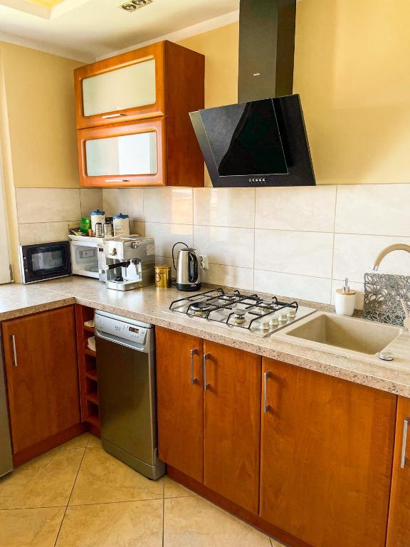 Kuchyňa alebo kuchynka v ubytovaní APARTAMENT RELAX