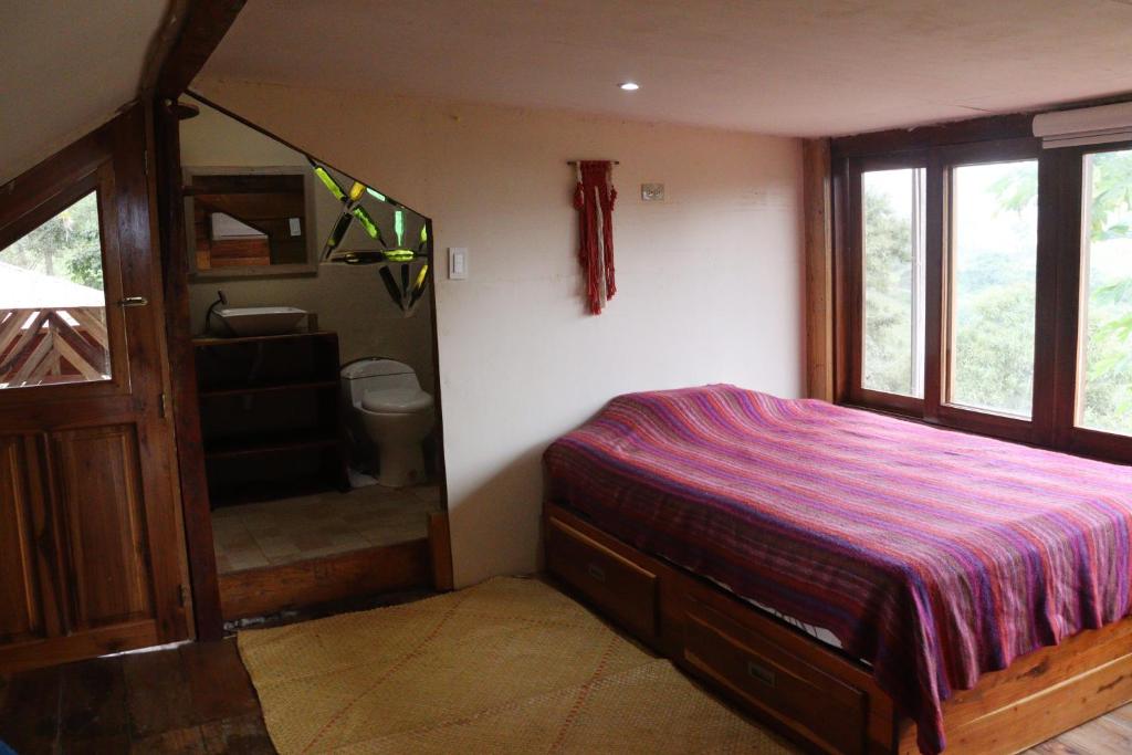 Postel nebo postele na pokoji v ubytování Diosa de la Montaña