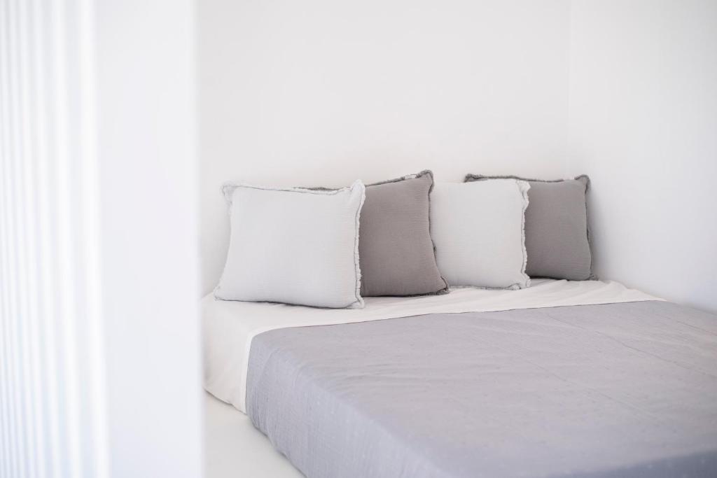Postel nebo postele na pokoji v ubytování CAMPO SUITES