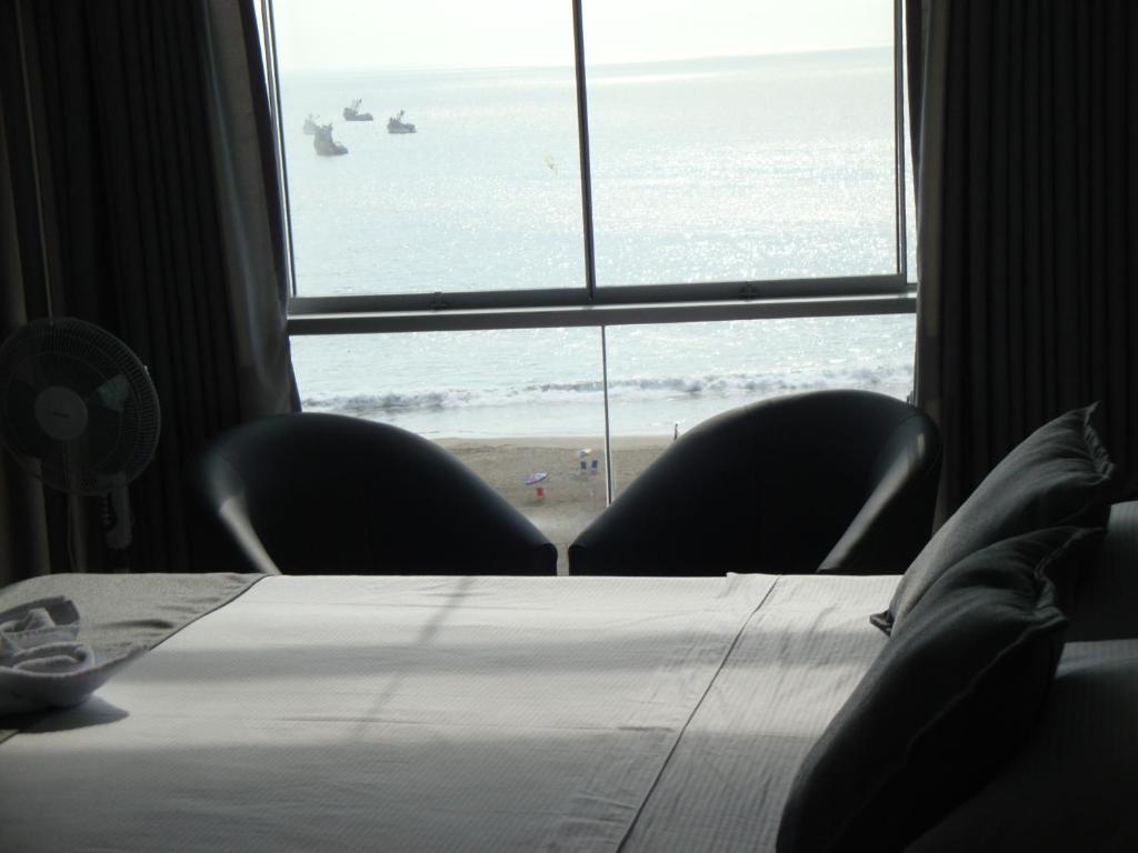 Postel nebo postele na pokoji v ubytování Hotel Terrazas Del Mar