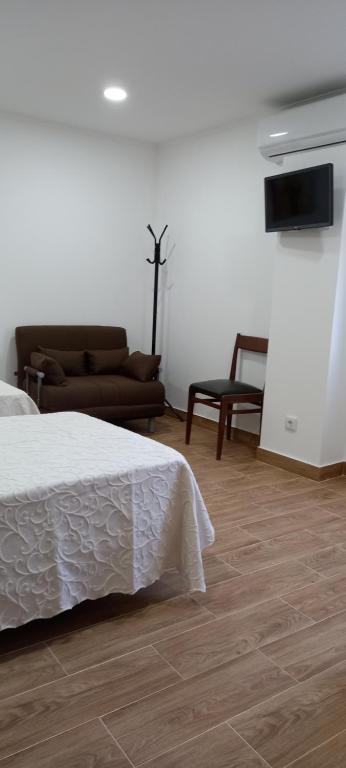 TV a/nebo společenská místnost v ubytování Monte da Vinha Nova