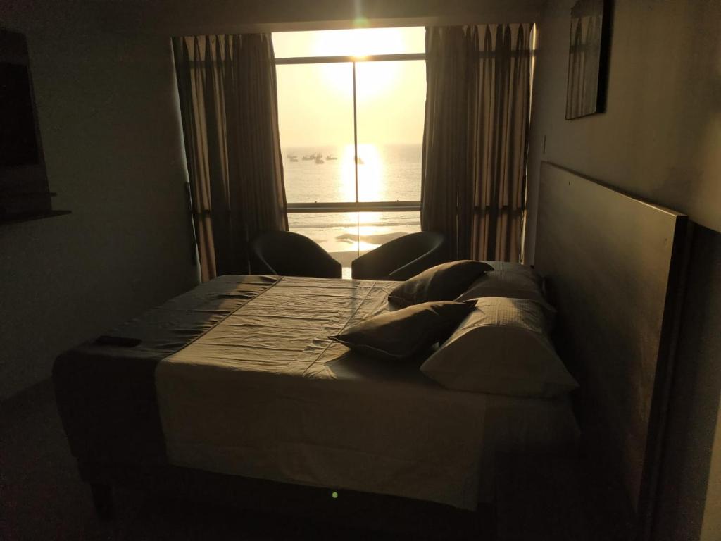 Postel nebo postele na pokoji v ubytování Hotel Terrazas Del Mar